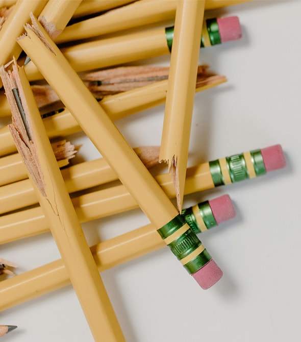 A image of a concrete sphere, balanced between two other larger spheres